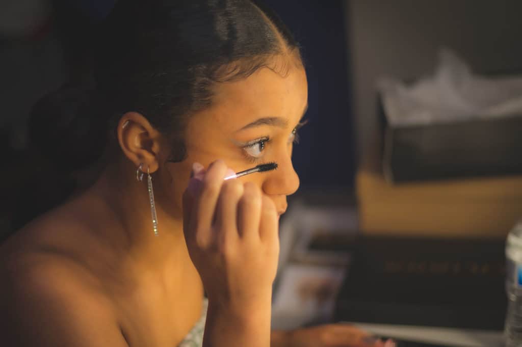 another photo of young lady preparing for prom in somerville.